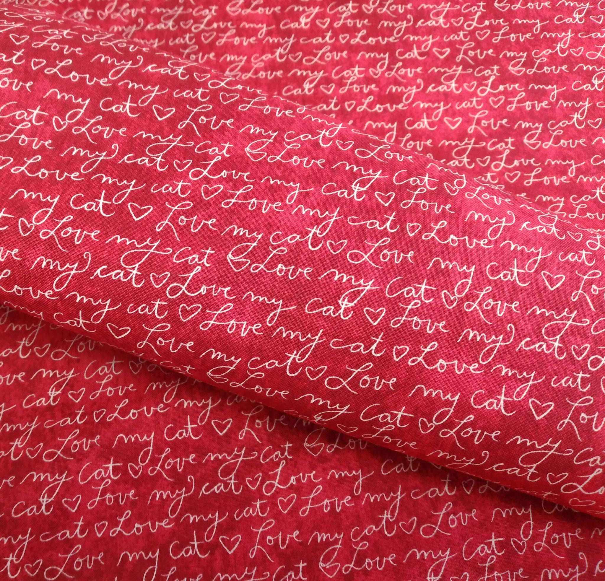 No Ordinary Cats - Script - Red by Northcott 1/2yd Cuts